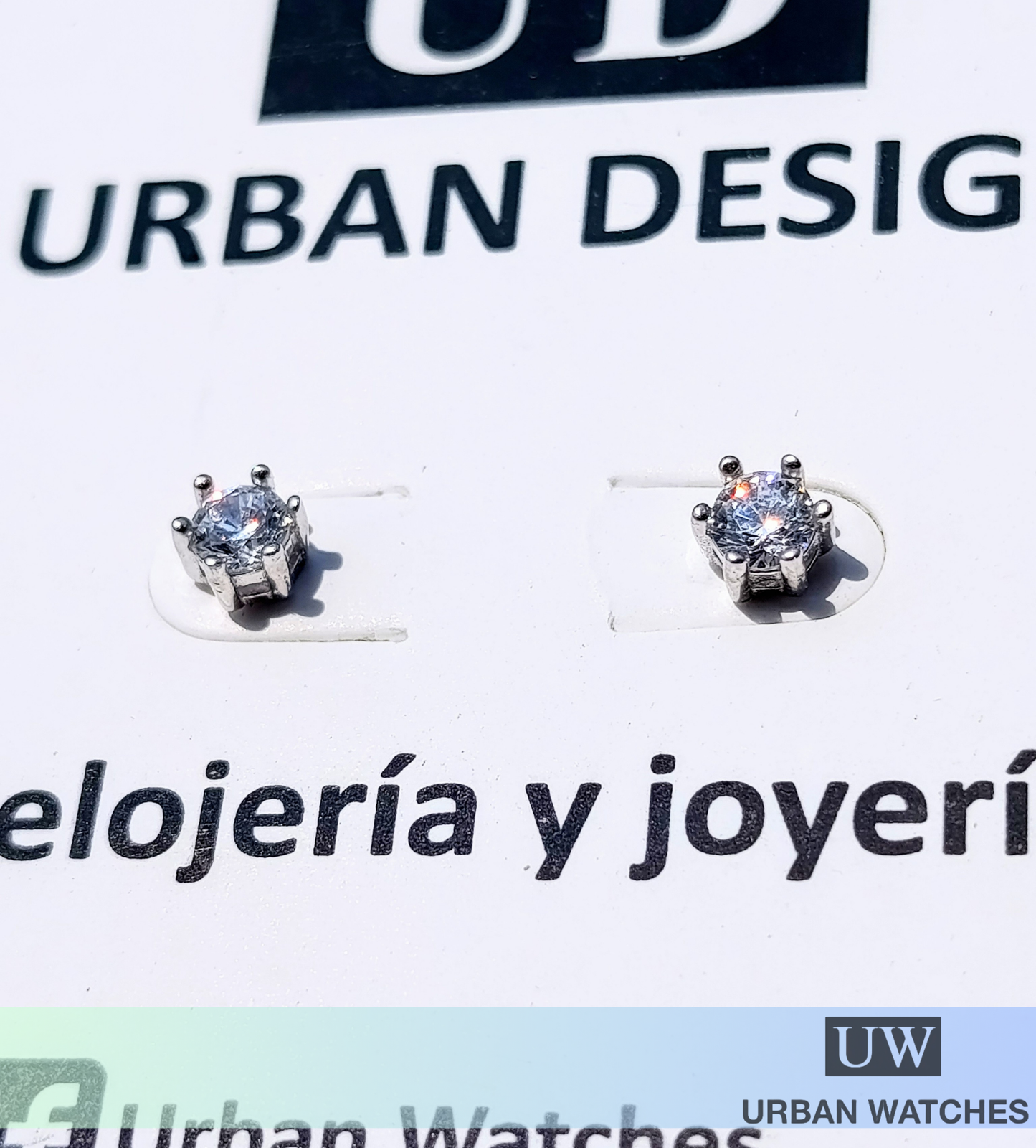Aretes Zircón 4mm en garra de plata 925