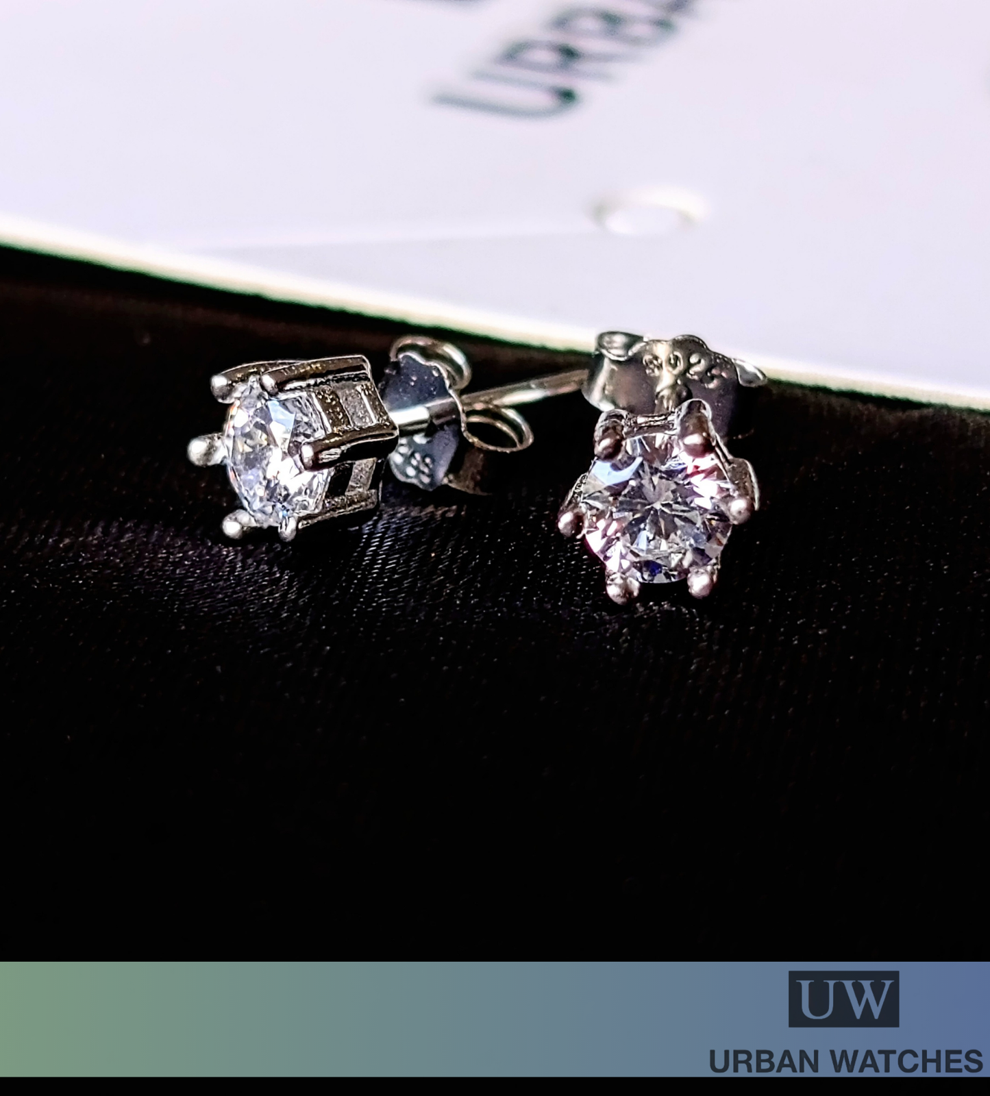 Aretes Zircón 4mm en garra de plata 925
